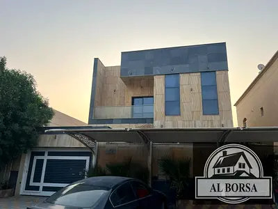 Villa for rent in Al Yasmin, 5 master bedrooms, living room, majlis, kitchen and maid's room