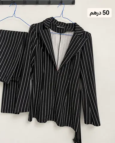 Black pinstripe women's blazer and matching skirt - size Small