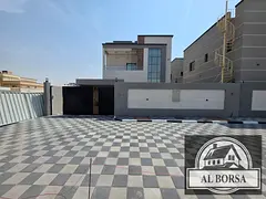 For sale in Ajman, Al Rawda 2 area, modern design villa, central air conditioning, 5 rooms, a living