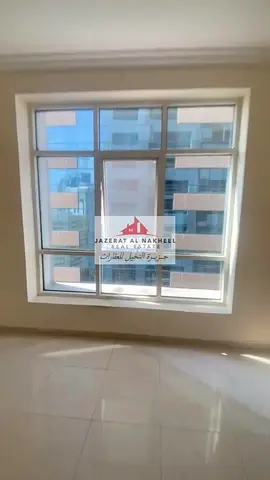 Two-bedroom apartment with a living room and a side view of Al Qasba in Al Majaz 2.