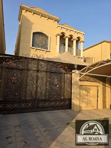 Luxurious villa for rent in Al Muwaihat 3 - prime location and unbeatable price! Consisting of five master bedrooms, a living room, and a large family