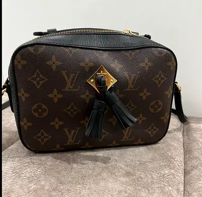 Coppy Black leather crossbody bag with gold zipper - good condition
