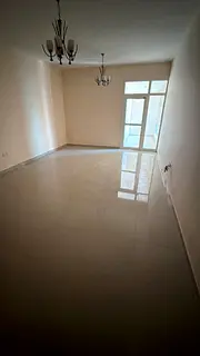 AED 35,000 per year | Spacious 1-Bedroom Apartment with Indoor Parking – Al Rashidiya 1
