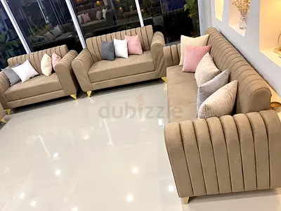 Very beautiful never used brand new 7 seatrt sofa beige color with multicolor pillows you can get