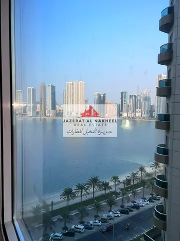 Apartment with a master bedroom and living room, featuring a side sea view in Al Khan.