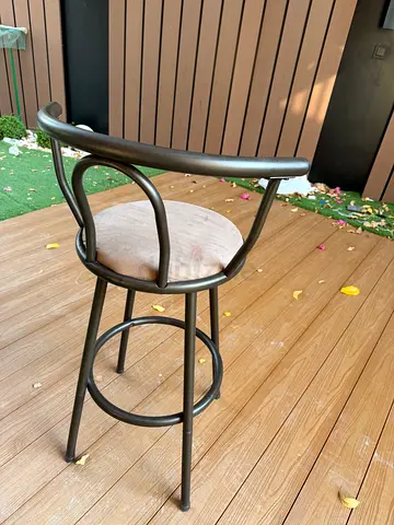 Metal bar stool with round wooden seat - used