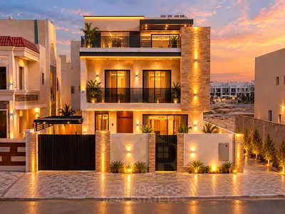 Villa for sale in Al Bahia, Ajman | 5 bedrooms | Two floors plus roof | Backyard | Price includes fees, registration, and freehold ownership.