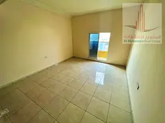 Spacious studio apartment available for annual rent in Al Rawda 2, Ajman, featuring a large living s