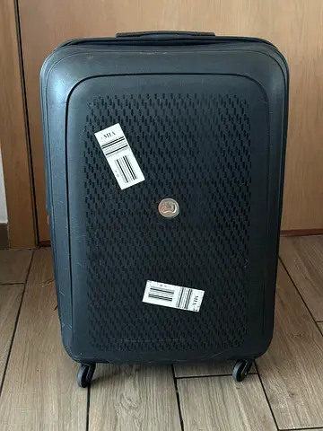 Big Delsey hard-shell suitcase in good condition