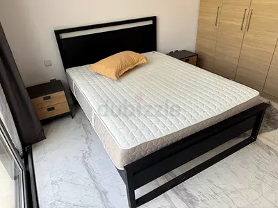 Selling high quality crate and barrel bed with side table