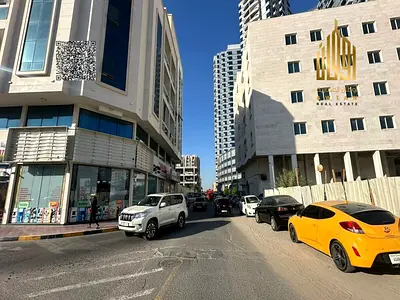 بناية سكنية تجارية للبيع | في الراشدية 2 عجمان |