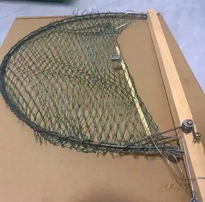 فخ طيور خشبي