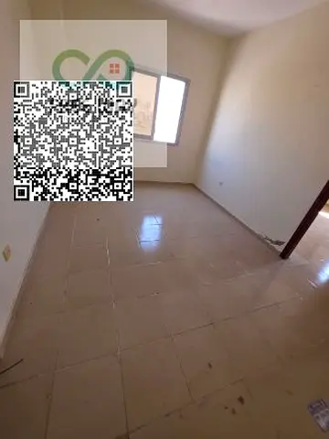 Spacious Studio for Annual Rent in Al Muwaihat 3 – Ajman A spacious studio with a separate kitchen