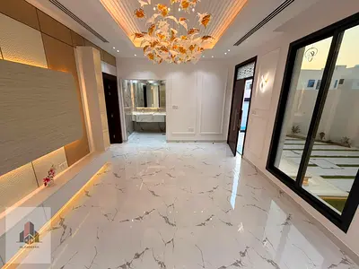 Luxury villa for sale in Al Helio 2 – Ajman | 6 master bedrooms | Ground floor + First floor + Roof | Registration and ownership transfer fees include
