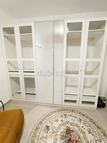 IKEA PAX wardrobe with glass doors and mirrored center - white, good condition
