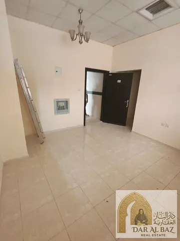 1-Bedroom Apartment for Annual Rent in Al Butina, Sharjah, Spacious Hall, Very Large Area, Central A/C, Ground Parking, Prime Location Near All Servic