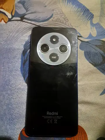 Redmi 14c 256gb smartphone (back view) - good used condition