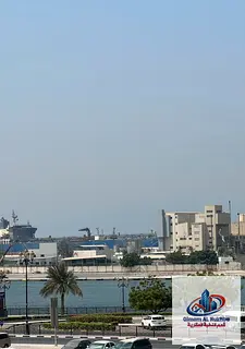 Start fresh in a first-occupancy one-bedroom apartment in Al Majarra with a sea view, glass windows,