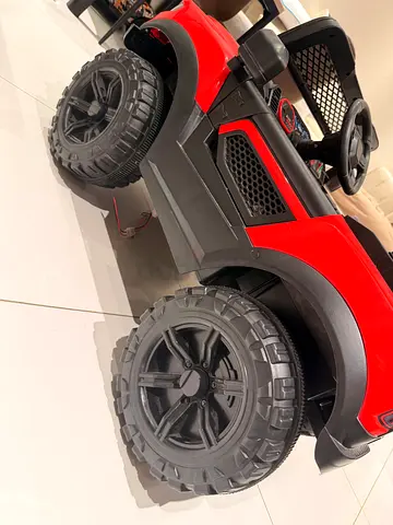 Red Battery-Powered Ride-On Jeep for Kids — Good Condition