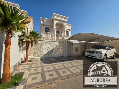 Villa for sale in Al-Haliyo area, 5 master bedrooms with swimming pool, majlis, living room, and utility room. Includes electricity and central air co
