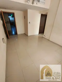 One bedroom and living room | Central air conditioning | One month free | Al Qasimia Station | 27,00