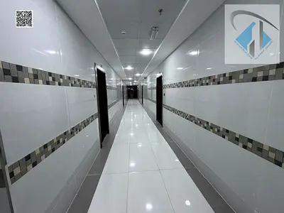 For rent in Al Yasmin area, a new building, first occupancy, close to all services, opposite Sharjah Al Rahmaniya