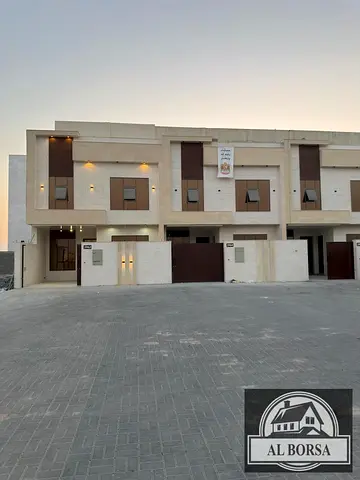 For sale in Al Helio 2, Ajman: A villa featuring 5 master bedrooms, a majlis, a living area, a kitchen, and a maid's room.