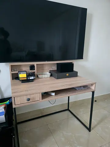 Modern wooden Desk with black metal frame - compact rectangular design.