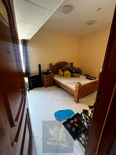 English: Studio for Annual Rent in Al Shuwaiheen Near the Corniche with Separate Kitchen & Central A