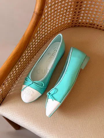 Light turquoise Chanel cap-toe ballet flats, size unknown, gently used