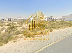 Commercial land for sale in Al-Hawshi.