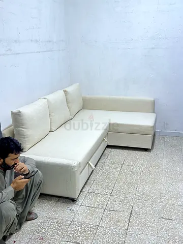 Beige L-shaped Sofa Bed with Storage Good Condition IKEA
