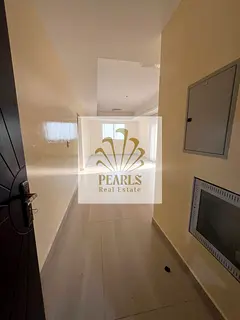 For families in Al Rawda 3 Ajman, 2 BR & hall with a roof, great space, open view, 2 baths. AED 48K