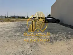 Land for sale at a bargain price in Al-Hawshi, Sharjah, on a main road, close to the mosque (300 met