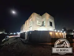 Villa for rent in Al Zahia, Ajman: 5 bedrooms, a majlis, a living area, a spacious kitchen, and a ma