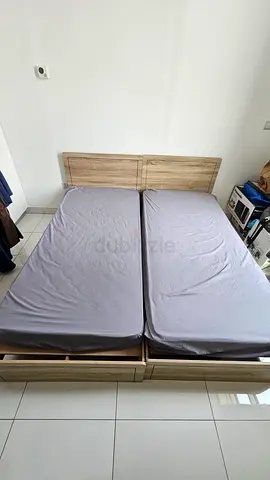 Pair of single beds with wooden headboards with 2 good quality clean mattresses - good condition