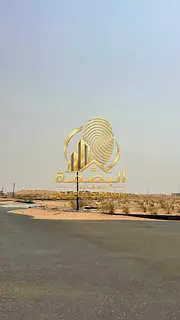 Corner plot of land for sale near the mosque in Al Sahma area, Sharjah.