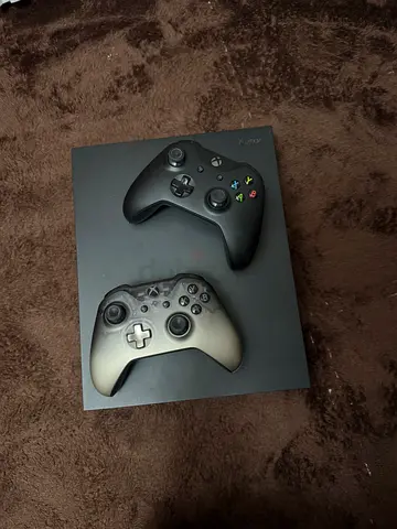 Xbox One x with 2 Wireless Controllers - Good Condition