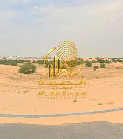 Residential corner plot for sale in Sharjah, Al-Hawshi area, next to the park. Installment plan avai