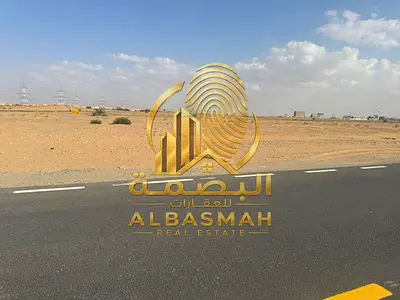 Commercial land for sale in Sharjah (Muzeiri'ah/Al Rahmaniya area), located on Street 36 and an access lane; freehold ownership available for Arabs.