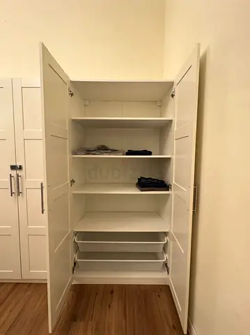 IKEA PAX Wardrobe / Tall White Cabinet - Excellent Condition- brand new , AED 500