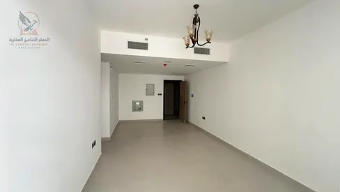 Two-bedroom apartment for rent in Al Tallah, Ajman. First occupancy, super deluxe finishing. Two bathrooms, balcony, built-in wardrobes. Ready to move
