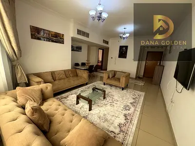 Two-bedroom apartment with a living room for monthly rent in Al Taawun, furnished with internet.