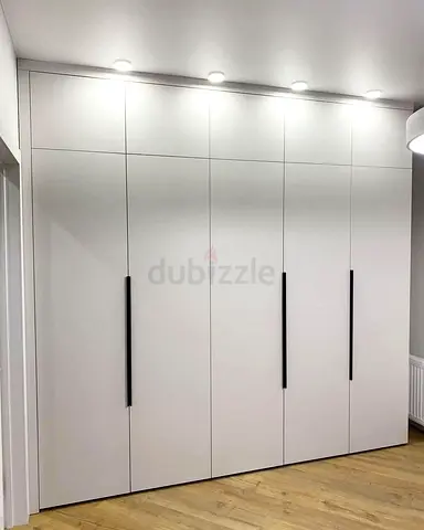 Large Built-in White Wardrobe with Black Handles