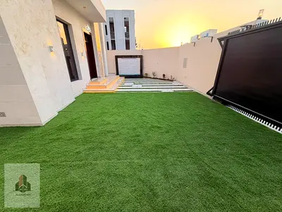 Luxury villa for sale in Al Helio 2 – Ajman | 6 master bedrooms | Ground floor + First floor + Roof | Registration and ownership transfer fees include