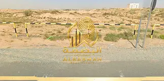 Commercial land for sale in Al Malha