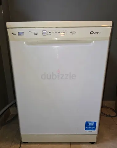 never used ..Candy Freestanding Dishwasher - 12 Place Settings, White