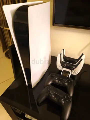Sony PlayStation 5 Console with 4 Controllers and Charger Stand - Good Condition