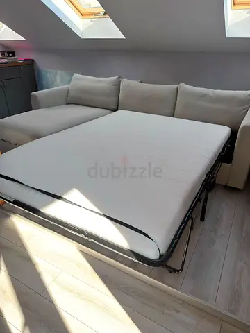 L-shaped sofa bed with chaise - comfortable fold-out sleeper