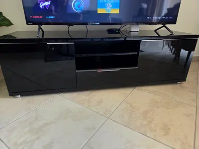 TV Stand unit: 2 side cupboards From Home Center. Motor City
